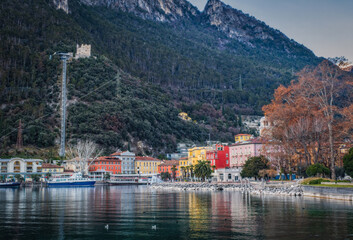 Fototapeta premium City of Riva del Garda at sunset time in January 2023.
