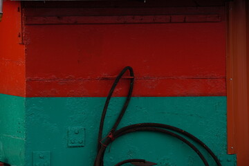 The starboard side of a boat by the color