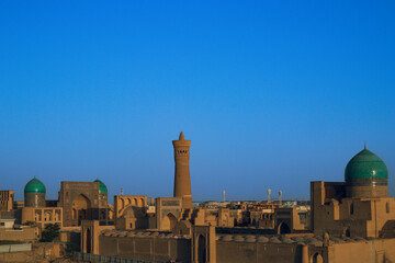 Sunet with panoramic view and Persian architecture in the ancient silk road city of Bukhara, Uzbekistan, Po-i-Kalan Islamic religious complex
