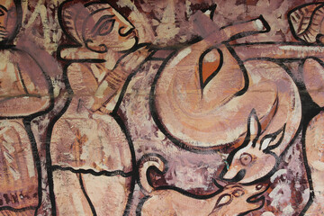 Fototapeta na wymiar Drawings and Paintings on Wall. Abstract painting and drawings on wall. Painting of Horse, ducks, cow, kings, queens, elephants on wall. Drawings and Paintings on wall.