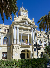 Street view of historic city hall building in the city of Malaga, Spain.