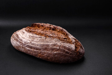 Delicious fresh brown sourdough bread with grains