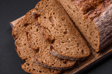 Delicious fresh brown sourdough bread with grains
