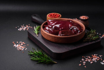 Fresh raw chicken, turkey or duck liver with salt, spices and herbs