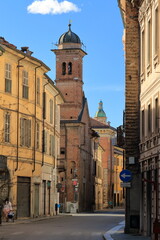 Fototapeta na wymiar View of the Church of San Rocco from Rome Street in the Italian city of Piacenza.