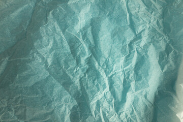 Fototapeta premium Light blue crumpled paper texture background