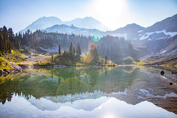 lake and mountains; Hiking the Wonderland Trail around Mt. Rainier; mountain landscape with clouds