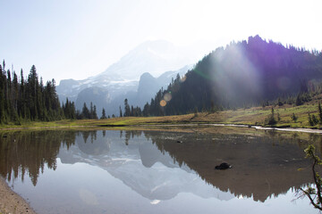 lake in the mountains, Hiking the Wonderland Trail around Mt. Rainier; mountain landscape with clouds