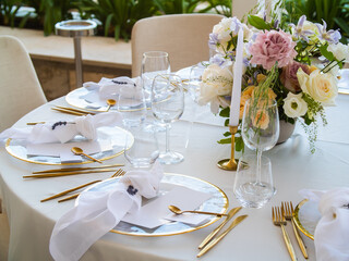 Luxury elegant wedding reception table arrangement and floral centerpiece - wedding banquet and event outdoor