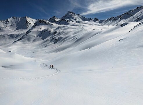 Beautiful Moutain Panorama.  ski tour through the wonderful mountain world in Davos. View of the Fl&uuml;ela Wisshorn and the J&ouml;riseen. Ski mountaineering in winter wonderland. High quality photo