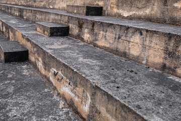 Gray, concrete stairs in an urban area. Background, copy space