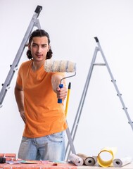 Young man contractor doing renovation at home