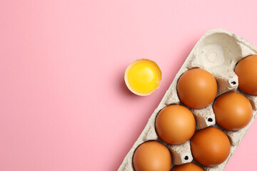 fresh farm chicken eggs on a colored background