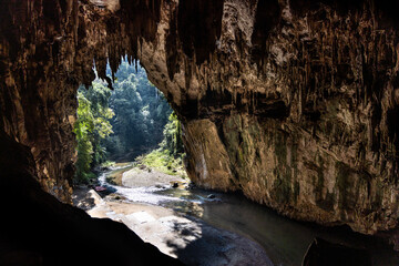 The scenic chamber with river in the Tham Nam Lod cave, popular tourist attraction in Mae Hong Son, Thailand
