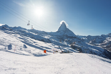Scenic sunrise or sunset view of Matterhorn - one of the most famous and iconic Swiss mountains, Zermatt, Valais, Switzerland