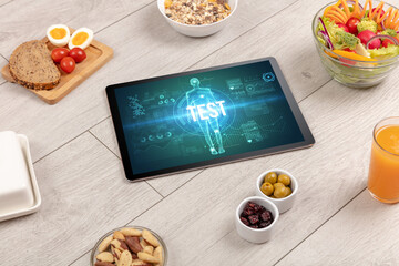 Tablet Pc with fruits, medical concept