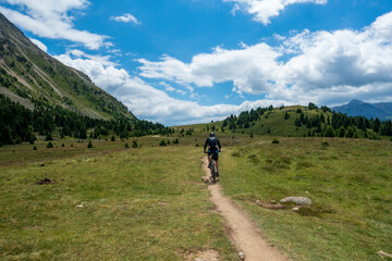 Fototapeta na wymiar Mountain bike trip high up in the mountains