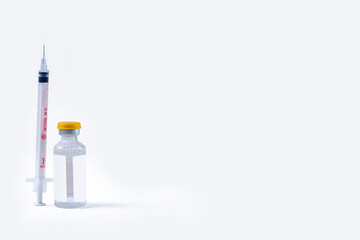 Covid-19 Coronavirus concept. Syringe and vial on a white background.