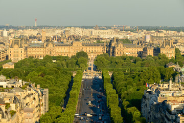 Fototapeta na wymiar The Avenue des Champs-elysees and the Louvre , in Europe, France, Ile de France, Paris, in summer, on a sunny day.