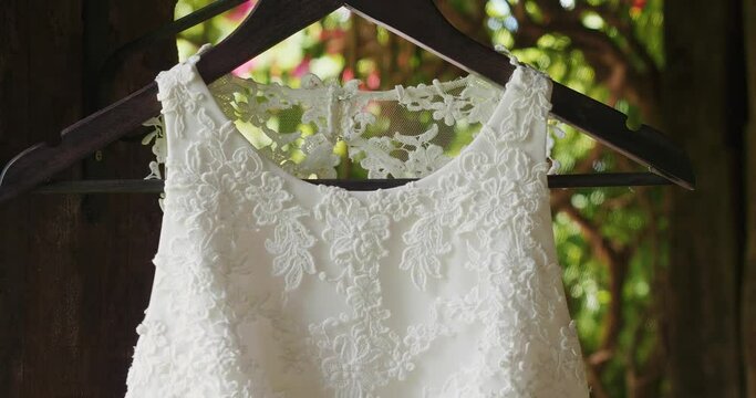 Embroidered wedding dress bodice on ancient shady terrace