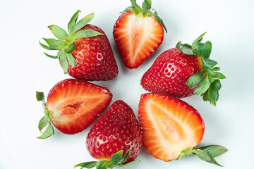 Strawberries in a circle on a white background