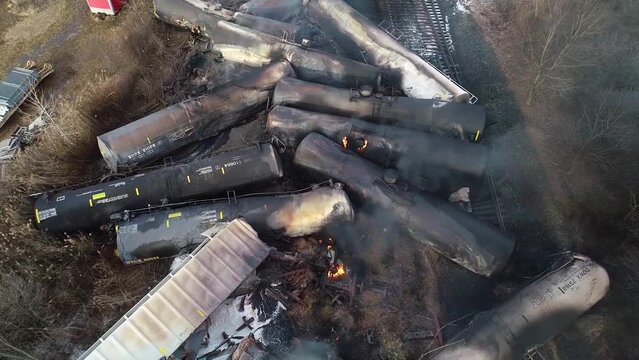 2023 - Excellent aerial footage of smoke and small flames rising from a derailed train in East Palestine, Ohio.