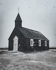 Black Church in the snow in Iceland