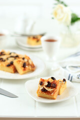 Sliced Homemade Prol Tape or Bolu Tapai on White Plate.