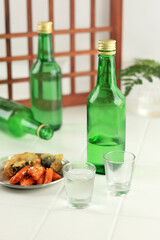 Soju Bottle and Small Glass Cup.