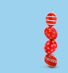 Stack of bright Easter eggs on light blue background, space for text