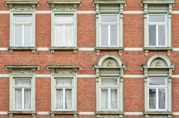 Fototapeta na wymiar View of residential building with windows