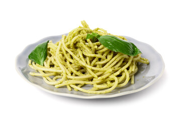 Plate with tasty pesto pasta on white background