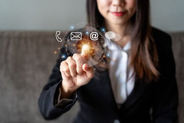 Businesswoman hand pointing email and chat message icon, Customer support hotline Contact us concept