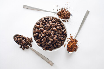 Coffee Grinds with Coffee beans and instant coffee in teaspoon measurements