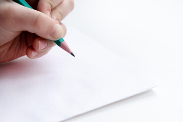 Close-up of children's hands. Prewriting practice to prepare the hand for writing numbers.