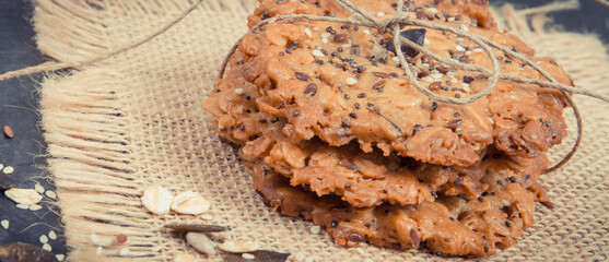 Fresh oatmeal cookies with honey and healthy seeds. Delicious crunchy dessert