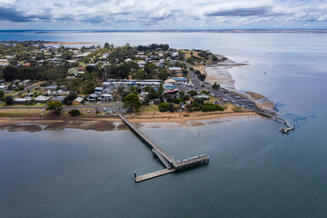 Aerial view of the jetty and shoreline at Rhyll on Phillip Island, Victoria Australia