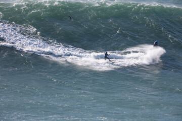 Obraz premium Man surfer ride on sea wave