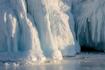 Ice splashes and icicles Olkhon on lake Baikal island in February, Russia