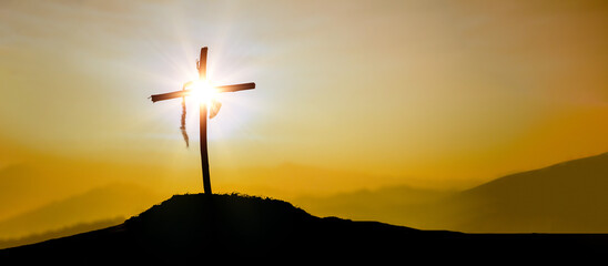 Crucifixion Of Jesus Christ - Cross At Sunset. The concept of the resurrection of Jesus in...