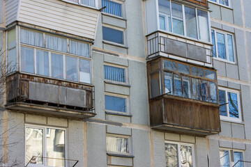 Close-up of old dilapidated balconies in an old soviet apartment building