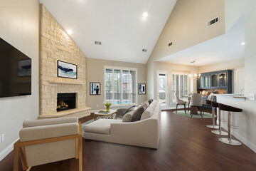 Spacious Big Living Room Of Luxurious Estate With Wooden Elements. Modern Mansion Interior With A New Stylish Furniture Design Concept For Residential Home. 3D illustration. Florida, USA 
