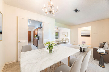 Spacious Big Living Room Of Luxurious Estate With Wooden Elements. Modern Mansion Interior With A New Stylish Furniture Design Concept For Residential Home. 3D illustration. Florida, USA 