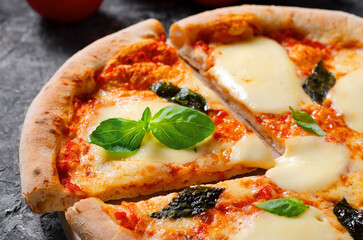 Italian Pizza Margherita with Mozzarella Cheese and Basil Leaves on Dark Background, Freshly Baked Pizza