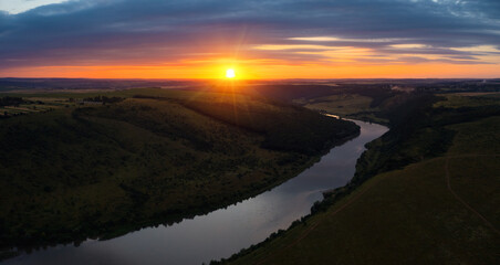 Fototapeta na wymiar A dramatic bird's eye view of the river mouth at sunset. Dniester canyon national park, Ukraine, Europe.