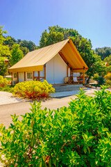 Modern glamping with canvas in a scenic conservation area on a sunny day. Croatia, Europe.