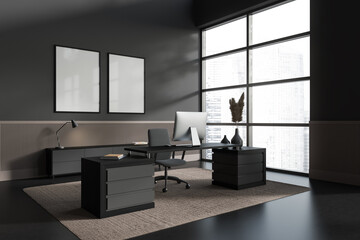 Gray and beige CEO office corner with posters