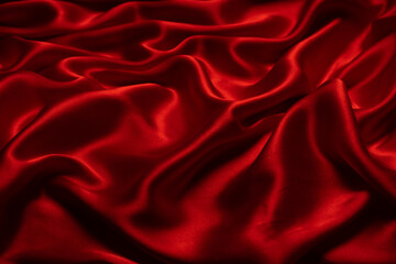 Obraz premium Red silk or satin luxury fabric texture can use as abstract background.