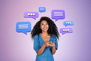 African woman with smartphone, looking up at text message bubble