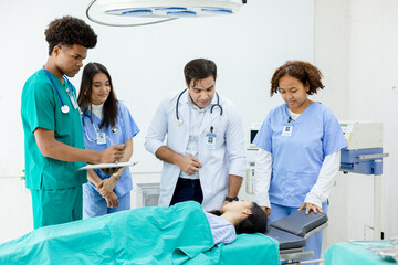 professional medical teacher give tuition group students in patient operating room.